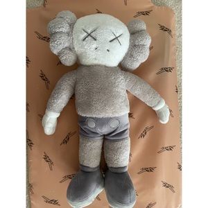 gray KAWS like plush like new no tag no packaging
